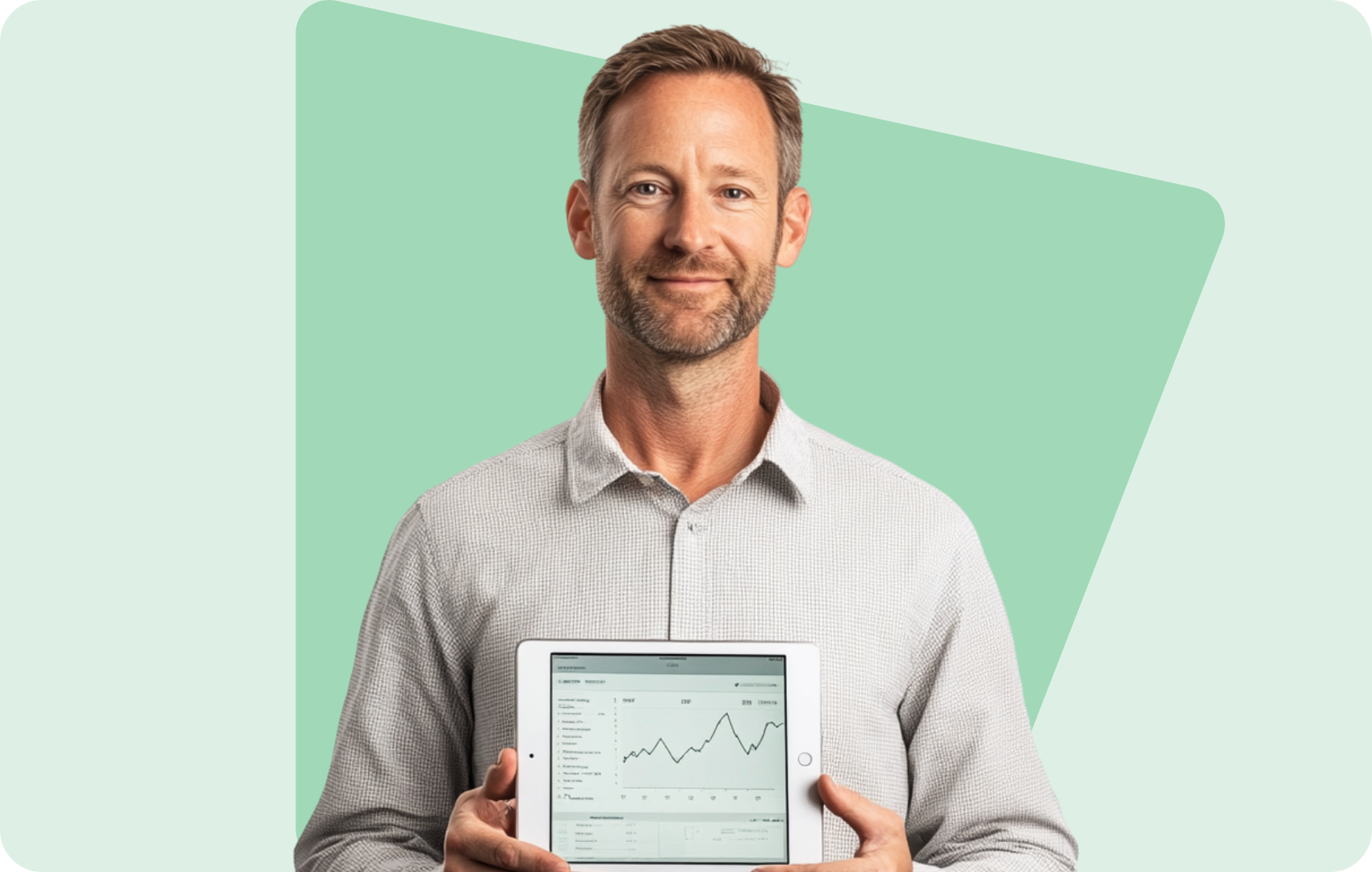 Man holding a tablet displaying a financial graph, standing in front of a green abstract background.